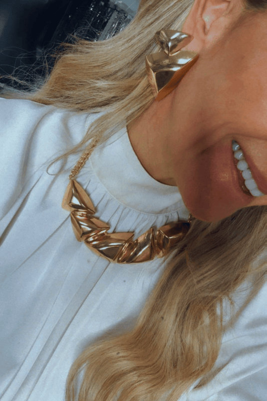 BRINCO PEQUENO METALLO DOURADO